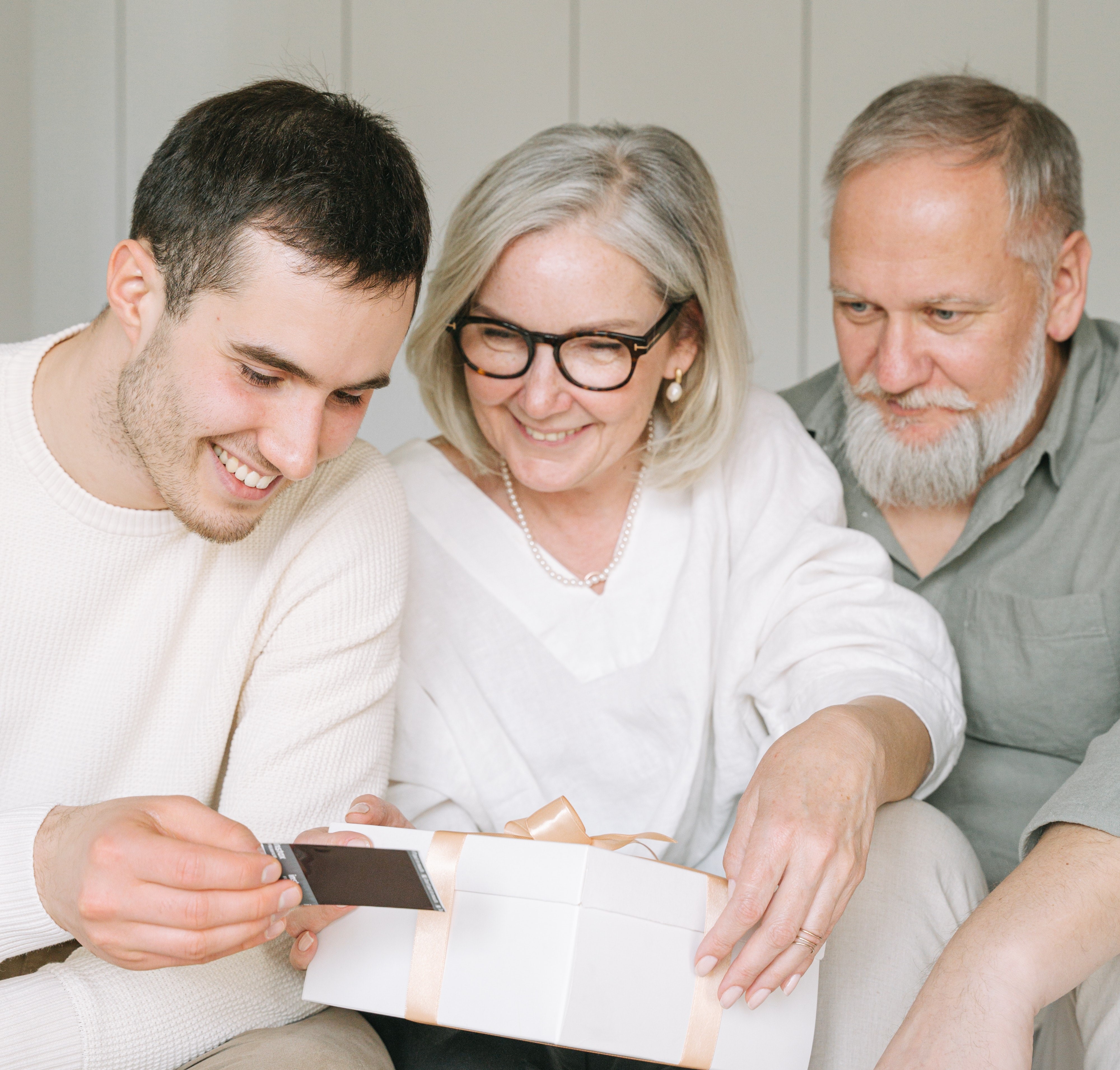 Older couple with young adult son